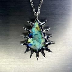 One-of-a-kind handmade labradorite  pendant. comes with 24 inch stainless steel chain material: 99.3% tin, 0.7% copper, Labradorite coated in protectaclear to protect and prevent tarnishing. protectaclear isn't permanent and may flake off gemstones over time To care for your piece, avoid contact with water, high temperatures, and pressure. In other words treat it like a lil piece of wearable art 🤎 since soft solder jewelry is fragile, should your piece break for any reason I offer a one time free repair. message for details.  @newlin online. newlinsbeenjewelin Soft Solder Jewelry, Solder Jewelry, Soft Solder, Soldering Jewelry, Labradorite Pendant, Steel Chain, Stainless Steel Chain, Wearable Art, Pendant Necklaces