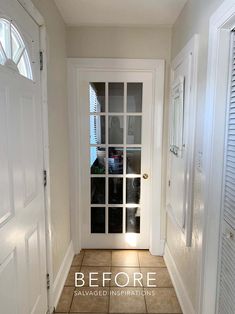 an empty hallway with white doors and tile flooring in front of the door is shown