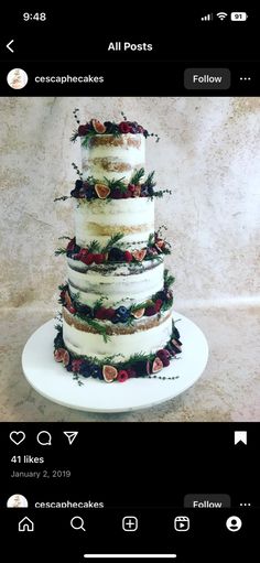 a three tiered cake sitting on top of a white plate