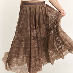 Gorgeous, Feminine, Bohemian Lace Woodland Fairy Skirt! So Girly And Fabulous! Could Easily Be Dressed Up Or Down! Would Look Cute With A Fancy Top Or Bandeau Or Equally Cute With A Flannel Shirt! So Many Possibilities! “Unleash Your Playful Side With This Mocha Brown Elastic Waist Raw Hem Lace Maxi Skirt! This Edgy Brown Skirt Features A Comfortable Elastic Waist, Raw Hem For A Touch Of Uniqueness, And A Delicate Lace Design With A Lining Inside. The Lace Is Super Soft, Too And Lays So Beautifu Bohemian Lace Lined Skirt, Brown Lace Skirt, Bohemian Brown Flared Skirt, Brown Bohemian Summer Skirt, Bohemian Brown Pleated Maxi Skirt, Bohemian Brown Flowy Skirt, Brown Bohemian Long Skirt, Lace Maxi Skirt, Fancy Top