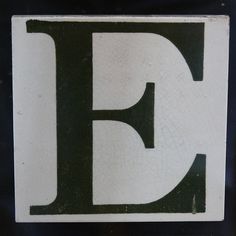 a black and white sign with the letter f in it's upper case is shown