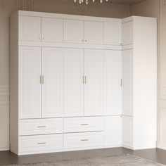 an empty room with white cabinets and chandelier