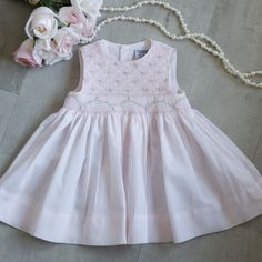 This Adorable Baby Girl's Dress In Size 6 Months Is Precious! Perfect For Spring! The Entire Front Bodice Is Done In A Lattice Smocking With Adorable Little Floral Bullion Rosebuds Evenly Spaced Throughout The Lattice Design. Just Above The Waist Has An Accordion Row Of Smocking With A Pink And White Embroidered Border. A Pink, White And Green Floral Vine Is Embroidered Across The Accordion Smocking. Gorgeous Details! This Dress Was Bought New And Never Worn. Perfect Condition! Nwot Friedknit Cr Smocked Dresses Baby Girl, Lattice Smocking, Month Embroidery, Smocked Baby Girl Dresses, Smocked Baby Dresses, Girls Smock, Baby Dress Design, Embroidered Border, Lattice Design