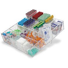 a clear storage container filled with assorted legos and building blocks on top of each other