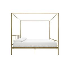 a white bed with a metal frame and pillows on it's bottom half, in front of a white background