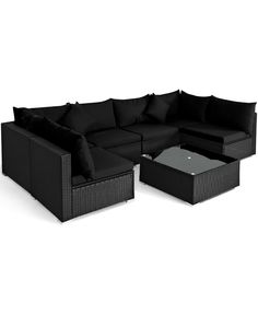 an outdoor furniture set with black cushions and pillows on the back, in front of a white background