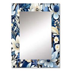 a mirror with blue and white flowers on the bottom, and a silver frame in the middle