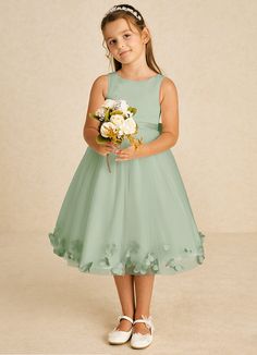 Dot features a charming A-line design crafted from a delightful mix of matte satin and tulle. Its scoop neckline and sleeveless style are complemented by a convenient zipper closure and whimsical bows, creating a playful yet elegant look for any special event. Sage Flower Girl Dress, Green Flower Girl Dresses, Tea Length Flower Girl Dress, Tea Length Tulle, Military Ball Dresses, Dusty Sage, Sage Dress, Special Event Dresses, Lace Bride