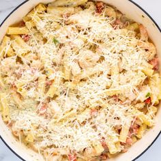 a casserole dish filled with pasta and cheese