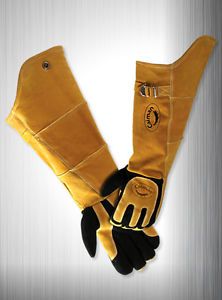 a pair of yellow gloves sitting on top of each other