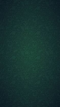 a dark green wallpaper with swirls on it