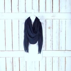 "Handmade large black gauzy crinkled cotton blend wrap shawl scarf/oversized lightweight black scarf/unisex raw hem fringe scarf Measurements... -length: 76\" -width: 56\" Features... -lightweight gauzy cotton/poly blend -raw fringe edges -oversized design perfect for use as a shawl, scarf or cover up -the perfect layering piece -handmade in California -made to order" Trendy Black Scarf For Fall, Trendy Black Scarves For Fall, Trendy Black Fall Scarves, Black Bohemian Scarf For Fall, Black Cotton Scarf For Winter, Black Cotton Scarves For Winter, Black Scarf For Fall, Black Cotton Winter Scarf, Oversized Chic Shawl