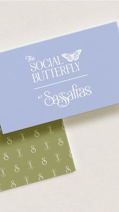 the social butterfly logo and business card are on top of each other, with different designs