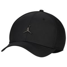 The headgear of heroes! Welcome the next level of comfort with the Jordan Jumpman Rise MTL Cap. Featuring a classic structured fit with a sloped crown and a curved bill, this cap keeps the heat off so you can feel as chill as you look. Sporting a metal Jumpman emblem, the Jordan Jumpman Rise MTL Cap lets you rep your Jordan pride in an elegant and understated style. Adjustable back strap offers a customizable fit. Sweatband provides a cool and comfortable feel. Hand wash. Body: 100% nylon; Front Black Jordan Hat, Classic Sports Trucker Hat With Curved Visor, Classic Sports Fitted Hat With Curved Visor, Classic Trucker Hat With Curved Visor For Sports, Classic Fitted Hat With Curved Visor For Sports, Classic Snapback Hat With Curved Brim For Sports, Classic Sports Hat With Curved Bill, Classic Trucker Hat With Curved Bill For Sports, Classic Curved Bill Trucker Hat For Sports