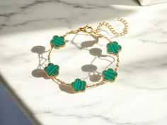 🔠 Gold-Plated 5-Leaf Clover Bracelet: Complete your look with this elegant bracelet featuring a 5-leaf clover design, available in five stunning colors. 💎 Material: High-quality stainless steel with a gold-plated finish. 🌸 Design: Delicate 5-leaf flower motif symbolizing luck and beauty. 🔄 Adjustable Fit: Comfortable and adjustable for all wrist sizes (20 cm). 💙 Available Colors: * Blue * Green * White * Black * Red ⏳ Processing Time: Ships within 3-5 business days. 🚚 Estimated Delivery Ti 5 Leaf Clover, Clover Bracelet, Beautiful Flower Designs, Clover Flower, Chic Gifts, Jewelry Luxury, Elegant Bracelet, Leaf Flowers, Flower Bracelet