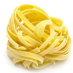 a pile of uncooked pasta on a white background