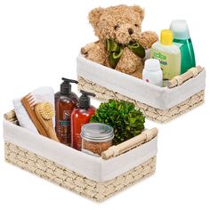 two baskets filled with items such as soaps, lotion and a teddy bear