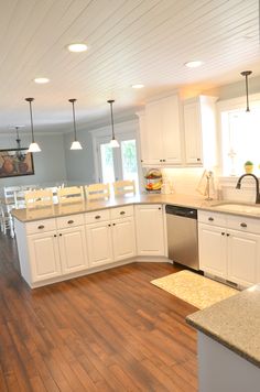 the kitchen is clean and ready to be used as a living room or dining area