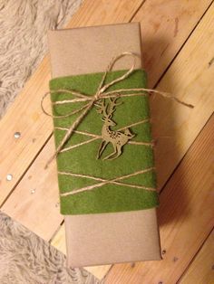 Gift Wrap handcrafted from cowboy boots. Shop  at ChrisThompsonBags.com and buy the best  at Chris Thompson Bags. Masculine Gift Wrapping, Wrapping With Brown Paper, Brown Paper Christmas Wrapping Ideas, Brown Paper Gift Wrapping, Yule Gifts, Rustic Gift Wrapping, Christmas Present Wrap