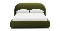 a bed with white pillows and green headboard on top of it, against a white background