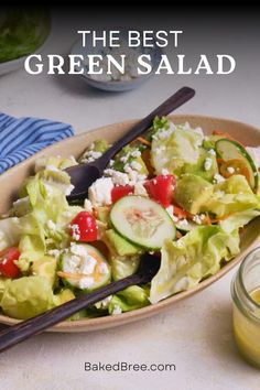 the best green salad with cucumber, tomatoes and feta cheese in a bowl