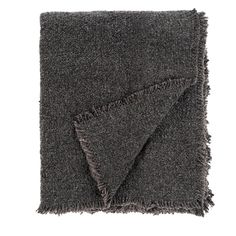 a gray blanket with fringes on it