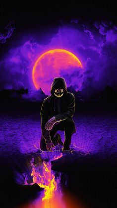 a man kneeling down in front of a purple moon