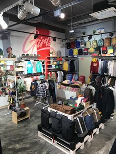 a clothing store with lots of items on display