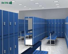 the lockers are all blue and there is a mirror in the middle with two benches on each side