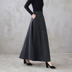 "This winter wool skirt is a classic piece of tailoring that will see you through rain or shine. It is cut with a flattering flared skirt to give you a wonderful shape. The winter skirt is perfect classic styling and ends at the ankle. This is a versatile skirt that you'll wear again and again. DETAILS: * 30% wool, 30% fiber, 40% polyester * fully satiny liner * Two side pockets * Right zip closure * A little Back elastic, comfortable wear * Plus size full skirt * Ankle length skirt * Perfect fo Winter Workwear Maxi Skirt With Lining, Winter Workwear Lined Maxi Skirt, Lined Maxi Skirt For Winter Workwear, Elegant A-line Bottoms For Winter, Solid Full-length Skirt For Fall, Solid Full Length Skirt For Fall, Full Length Skirt For Fall, Elegant Winter Maxi Skirt, Winter Workwear Fitted Maxi Skirt