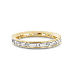 a yellow gold wedding band with baguettes