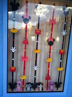 a window decorated with mickey mouse decorations