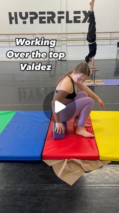 a woman is doing yoga on top of a multicolored mat with the words, working over the top valdes?