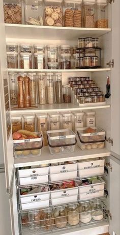 an organized pantry with lots of food in it