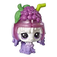 the littlest pet shop figurine has grapes on it's head and is wearing