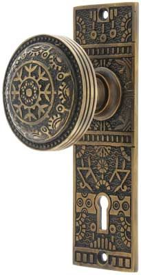 an ornate door knob with a decorative design on it