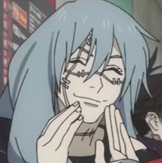 an anime character with blue hair holding her hands to her face