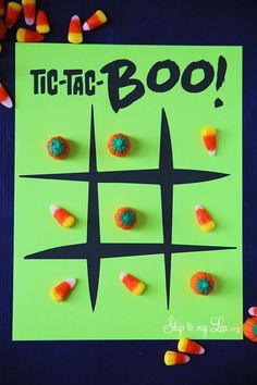 a poster with candy on it that says tic - tac boo