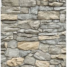 a stone wall that is made out of rocks