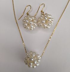 "To Enter My Shop https://OccasionsGiftShop.etsy.com DESCRIPTION This beautiful freshwater pearl cluster necklace and earring set is so unique! It would be such a great gift, or a wonderful addition to your jewelry collection. Message me for a different chain length. ~ Pearl clusters are around 3/4\" ~ 16\" Gold filled chain or sterling silver chain ~ Gift boxed" Pearl Cluster Necklace, Pearl Cluster Earrings, Cotton Boll, Pearl Cluster, Cluster Necklace, Necklace Pearl, Wedding Jewellery Necklace, Necklace And Earring Set, Wedding Necklaces