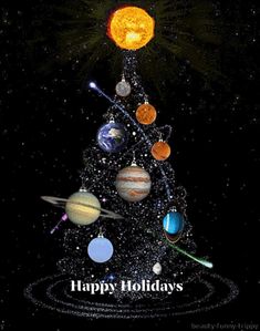 a christmas tree with planets on it and the words happy holidays written in large letters