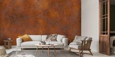 a living room filled with furniture next to a wall covered in rusted metal sheets