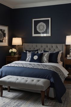 a bedroom with blue walls and white bedding