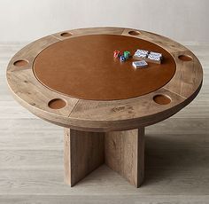 a wooden table with two dice on it