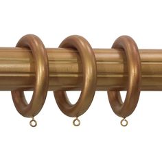 the curtain rod has two rings on each end and is made out of brass colored metal