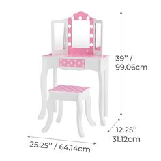 a white vanity with pink polka dots on it and a stool in front of it