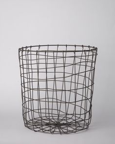 a wire basket is shown against a white background