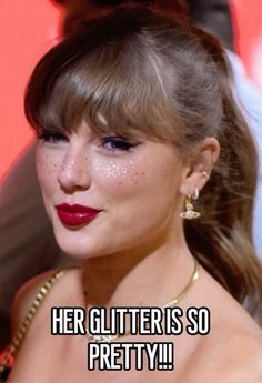 taylor swift is so pretty with her glitters on her face and lip glosses