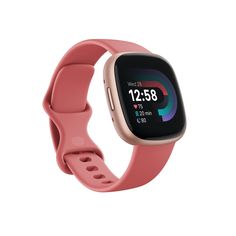 the fitbit smart watch is shown in pink