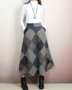 * A boho wool skirt, mid-calf length and fully lined. * Fixed waist on the front and elastic waist on the back, side zipper closure.. * Materials: 30% wool, 70% polyester; lining- 100% polyester Shop sizing chart FYI ( actual body figures, not laying flat clothes measurements) Size XS (US 2, UK 6, German 32, French 34) Bust: fits bust around 33.5 inches/85cm Waist: fits waist around 26 inches/66cm Hips: fits hips around 36 inches/91cm Size S (US 6, UK 10, German 36, French 38) Bust: fits bust ar Patchwork Long Skirt For Fall, Fall Long Skirt With Patchwork, Winter Full Maxi Skirt With Pockets, Bohemian Long Winter Skirt, Bohemian Long Skirt For Winter, Winter Bohemian Long Skirt, Winter Midi Maxi Skirt In Relaxed Fit, Winter Bohemian Skirt, Fall Patchwork Long Skirt